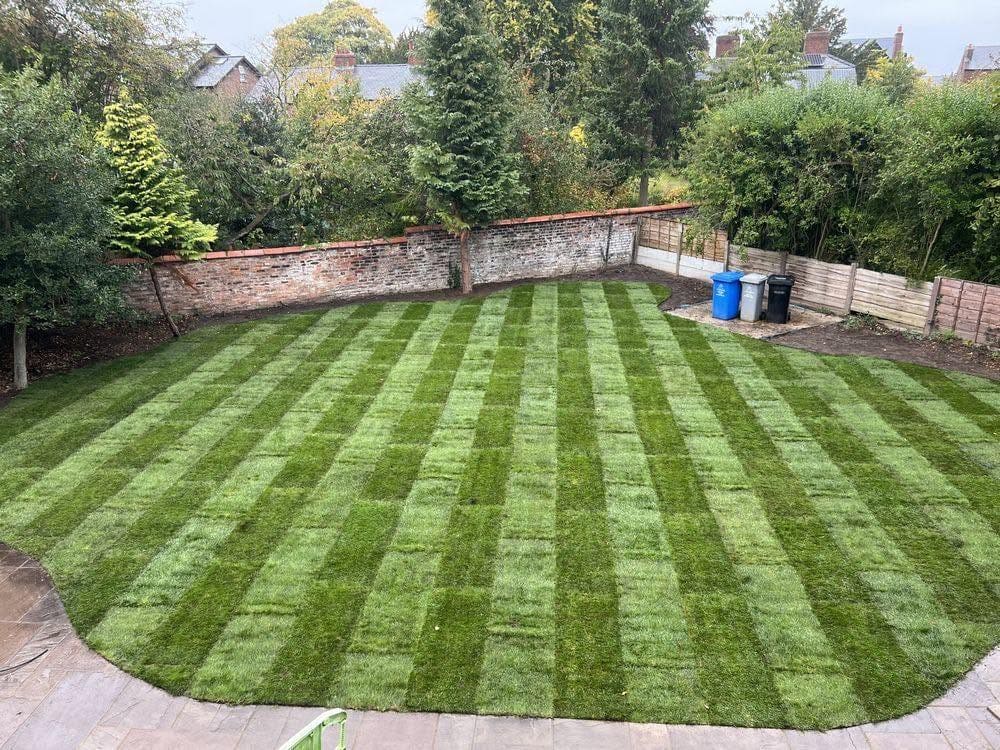 Full lawn turfing in a walled garden