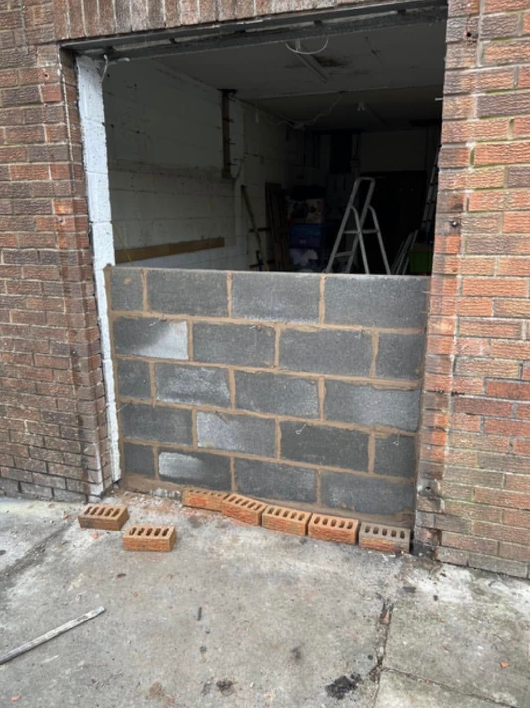 Before: old window and brickwork needing repair